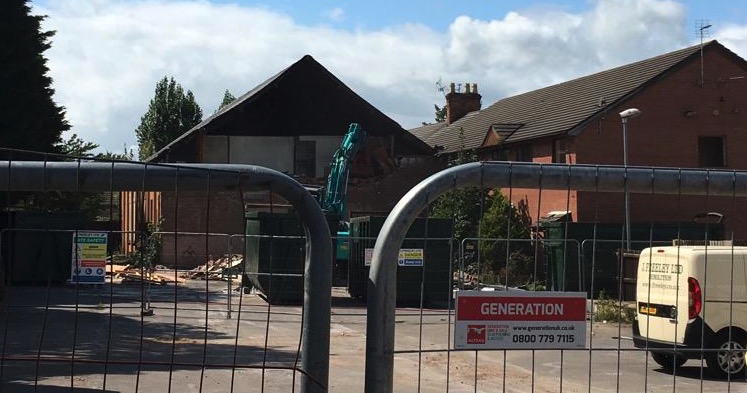 Work to demolish a former social club in Connah’s Quay gets underway