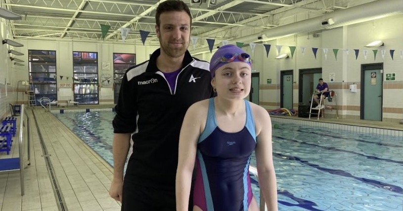 Young Flintshire swimming star breaking barriers and defying the odds