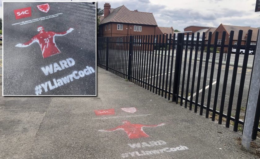 Graffiti mural of Wales keeper Danny Ward appears outside a Flintshire High School