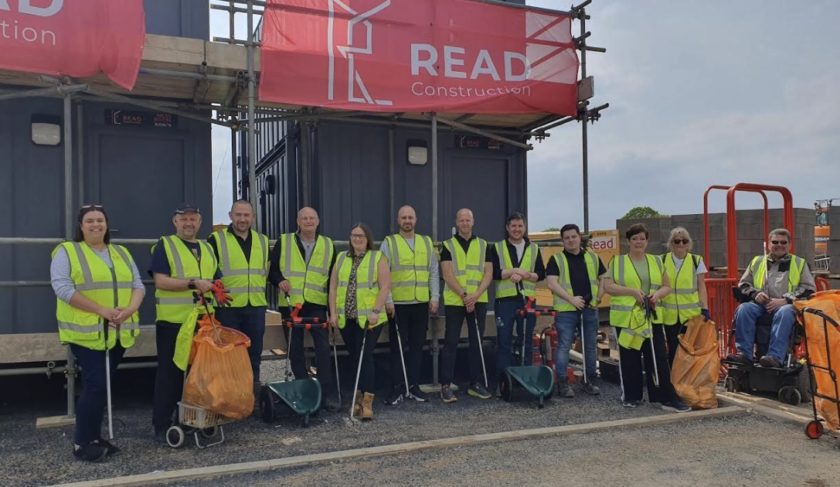 Construction workers team up for Flint litter pick