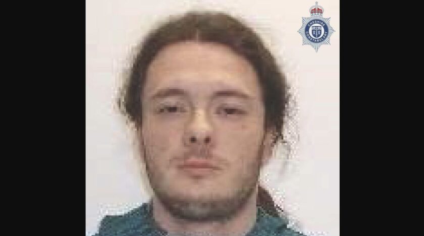 Police search for escaped prisoner with North Wales links