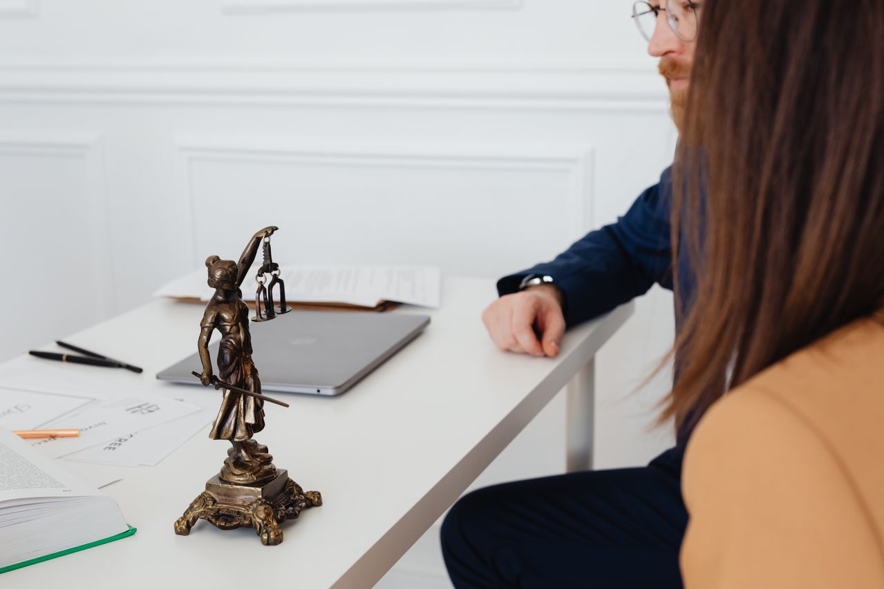 Photo by www.kaboompics.com from Pexels: https://www.pexels.com/photo/couple-in-lawyer-office-7876314/